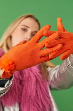 JAYLEY Orange Faux Suede Gloves With Faux Fur Pom